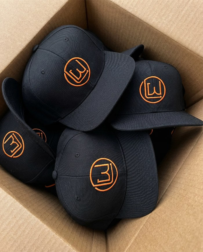 Box of Laron Wear caps